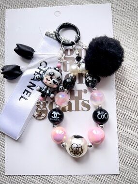 Authentic Chanel Ribbon with Unbranded Black & Pink Pom Pom Beaded Keychain